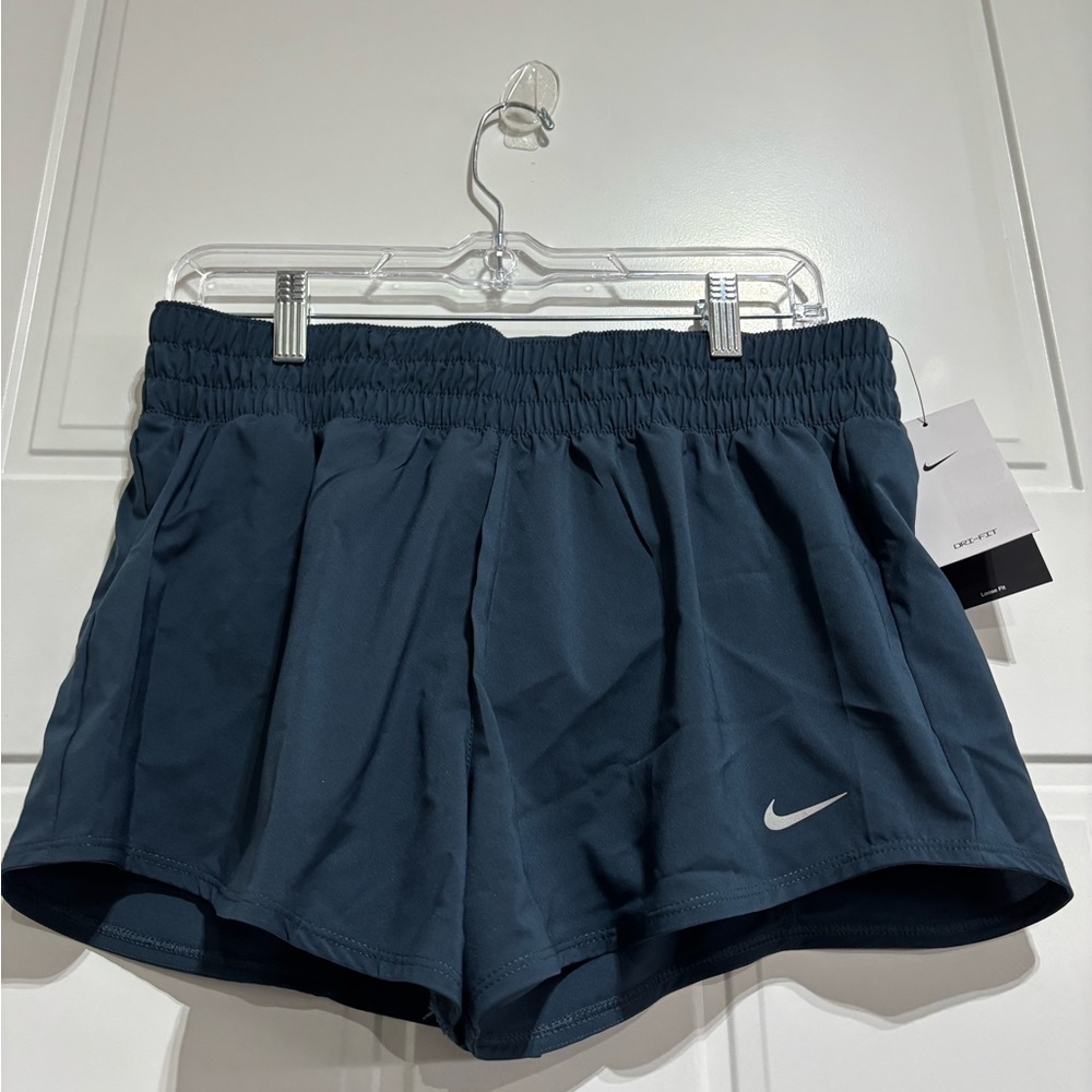 Nike Training Loose Fit,panty lined,back & inner pockets,elastic waist